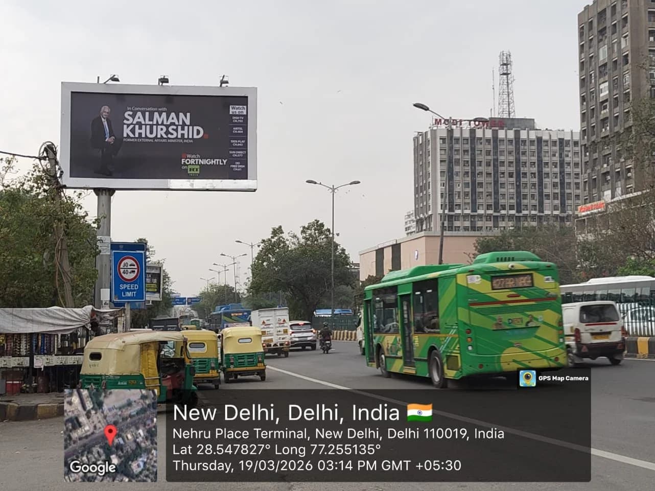 Large-format unipole above traffic at Nehru Place, New Delhi
